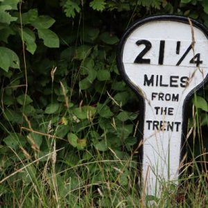 One of the canalside signs showing distance to the river Trent